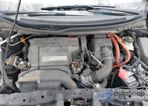 2012 Honda Civic Hybrid z USA, uszkodzony, nr VIN JHMFB4F28CS009072